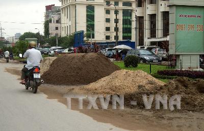 Hà Nội còn 173 bãi chứa vật liệu xây dựng trái phép ảnh 1
